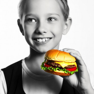 Girl holding burger