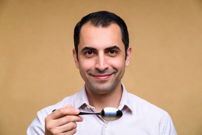 Man holding spoon