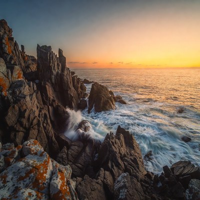 Ocean Waves Crashing on Sunset Rocks