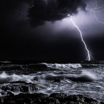 Lightning Storm Over Ocean Rocks