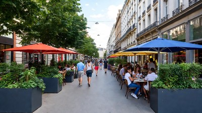 Busy Paris Street Cafe with Patrons