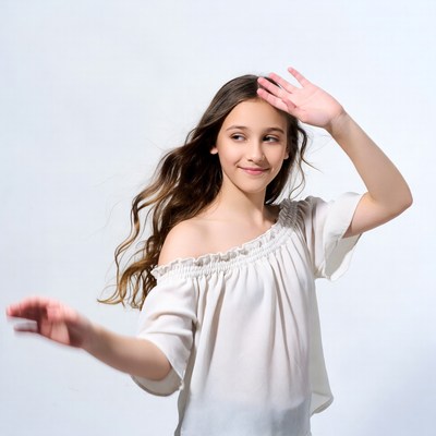 Girl shielding eyes with hand