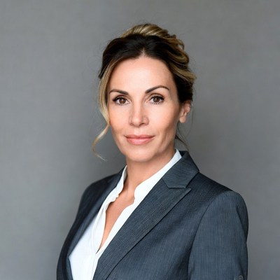 Professional woman in gray suit