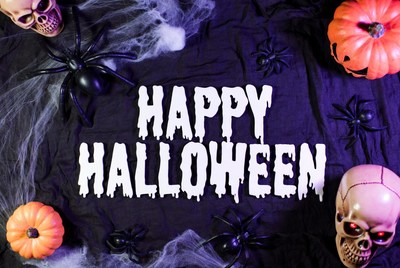 Happy Halloween with Skulls and Spiders