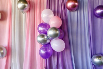 Colorful Balloons with Pink Purple Drapes
