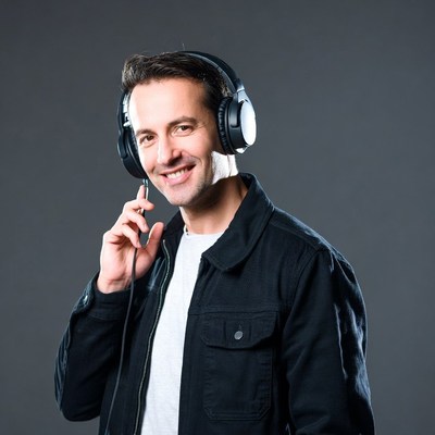 Man smiling with headphones