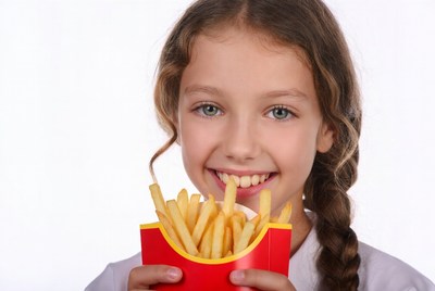 Girl eating french fries