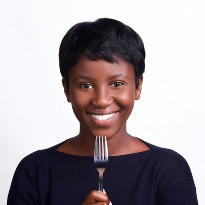 African-American woman holding fork