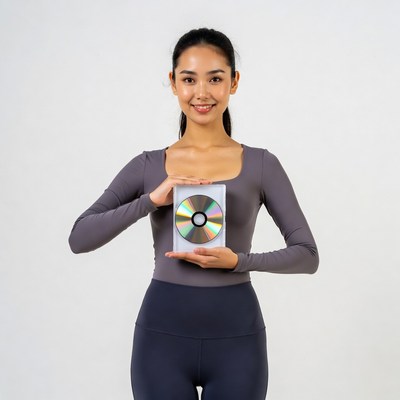 Asian woman holding CD