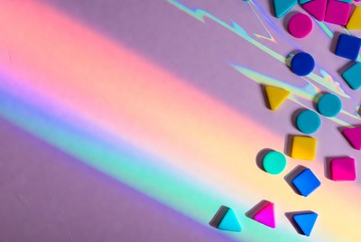 Colorful geometric shapes on purple background