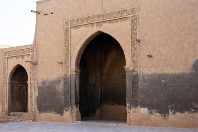 Ancient Mud Archway with Intricate Carvings