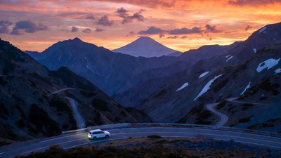 Car Driving Mountain Road at Sunset