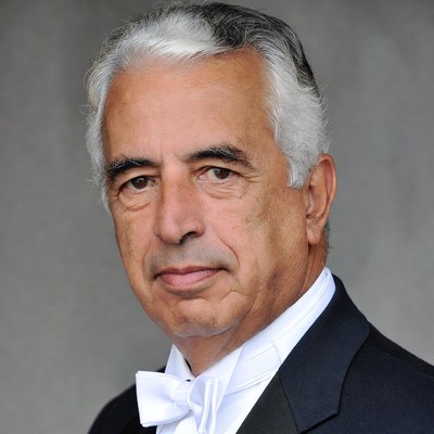 Elderly man in tuxedo with bow tie