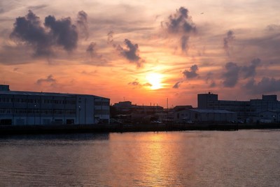 Sunset over waterfront buildings