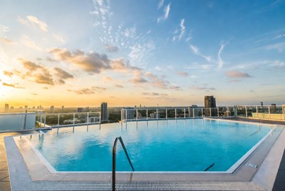 Infinity Pool at Sunset Cityscape