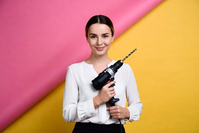 Woman holding drill