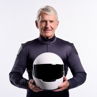 Senior man holding white helmet