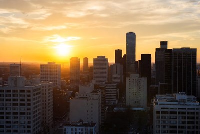 Sunset over city skyline