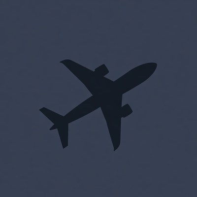 Airplane silhouette on dark background