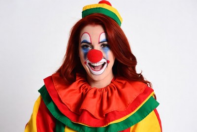 Redhead woman in clown costume