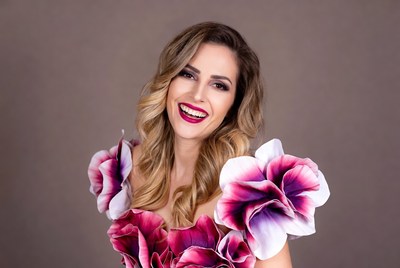 Woman in pink flower shoulder dress