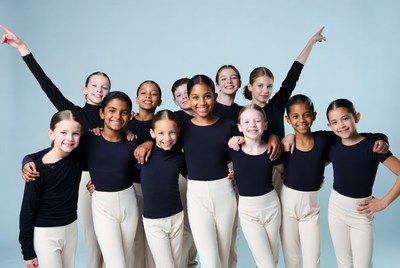 Diverse girls dance team posing together