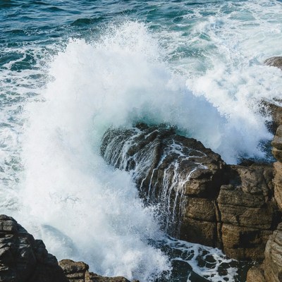 Ocean Wave Crashing on Rocks