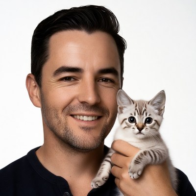 Man holding cute kitten