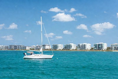 White Sailboat on Turquoise Water