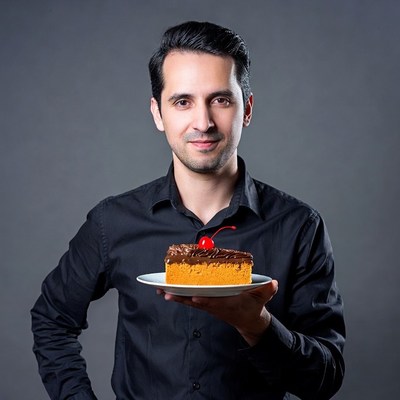 Man holding chocolate cake slice