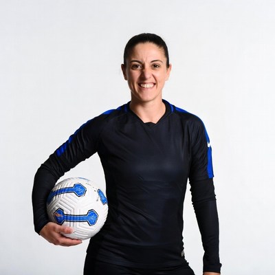 Woman holding soccer ball