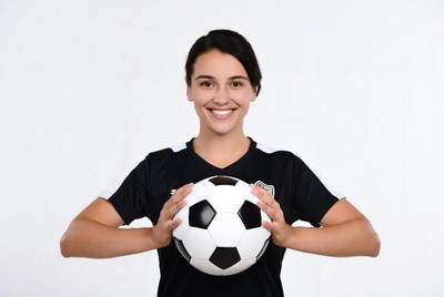 Woman holding soccer ball