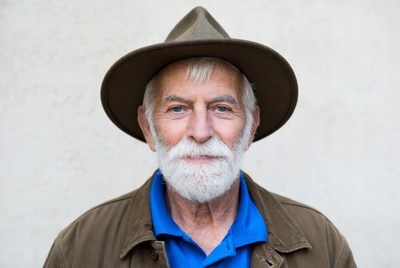 Elderly man in hat and jacket