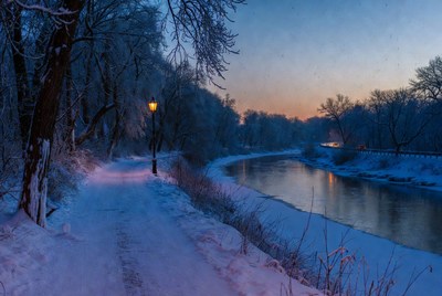 Snowy Path with Lantern by River