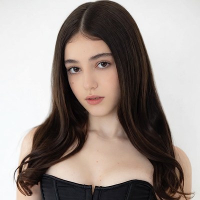 Young woman in black corset