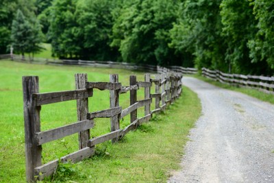 Wooden fence along rural path