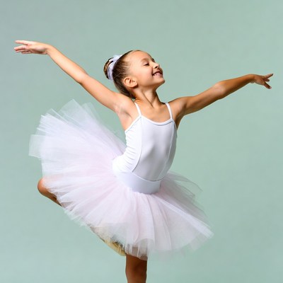 Young girl dancing in tutu