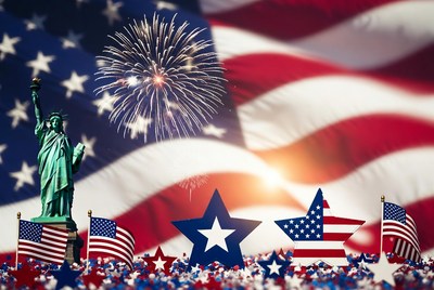 Statue of Liberty with fireworks and flags