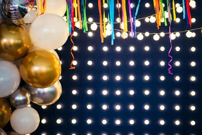 Colorful Balloons and Streamers on Dark Background