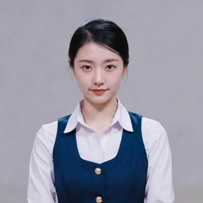 Asian woman in navy vest uniform