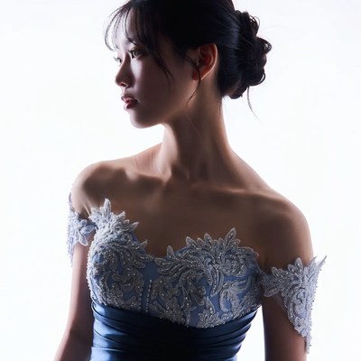 Asian woman in blue lace gown