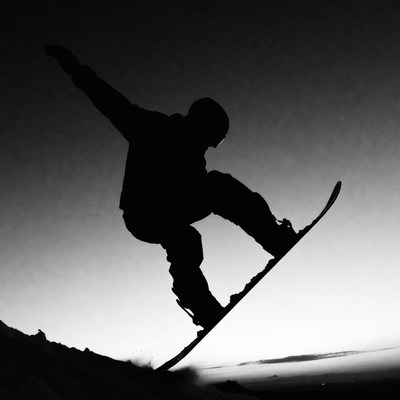 Snowboarder Silhouette Jumping on Snow