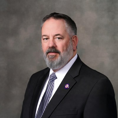 Man in suit with gray beard