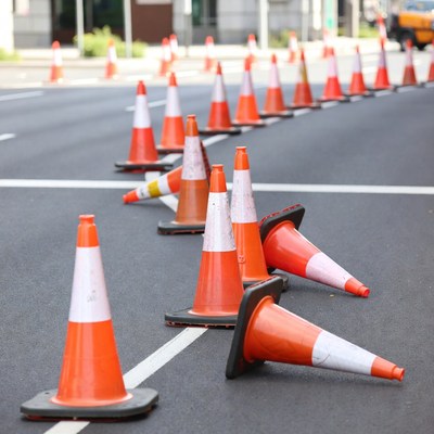 Orange traffic cones on road