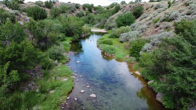 Aerial view of winding river in green canyon