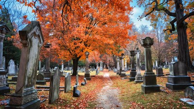Autumn Cemetery Path with Gravestones