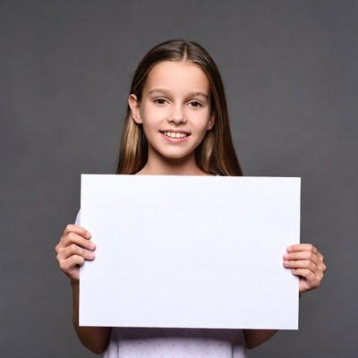 Girl holding blank sign