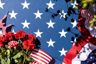 American Flag with Red Geraniums