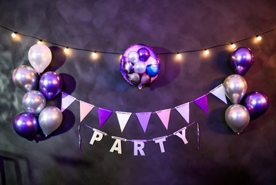 Purple Party Balloons and Banner