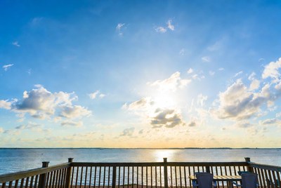 Ocean View from Wooden Deck at Sunset